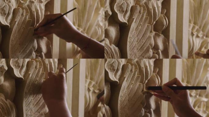 按照制造传统的教导，工匠用粉笔创作雕塑，手工制作雕像和艺术品。