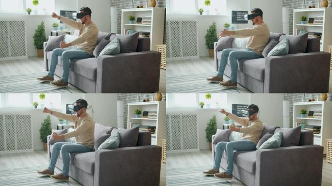 快乐的家伙在虚拟现实护目镜中玩游戏，享受驾驶体验