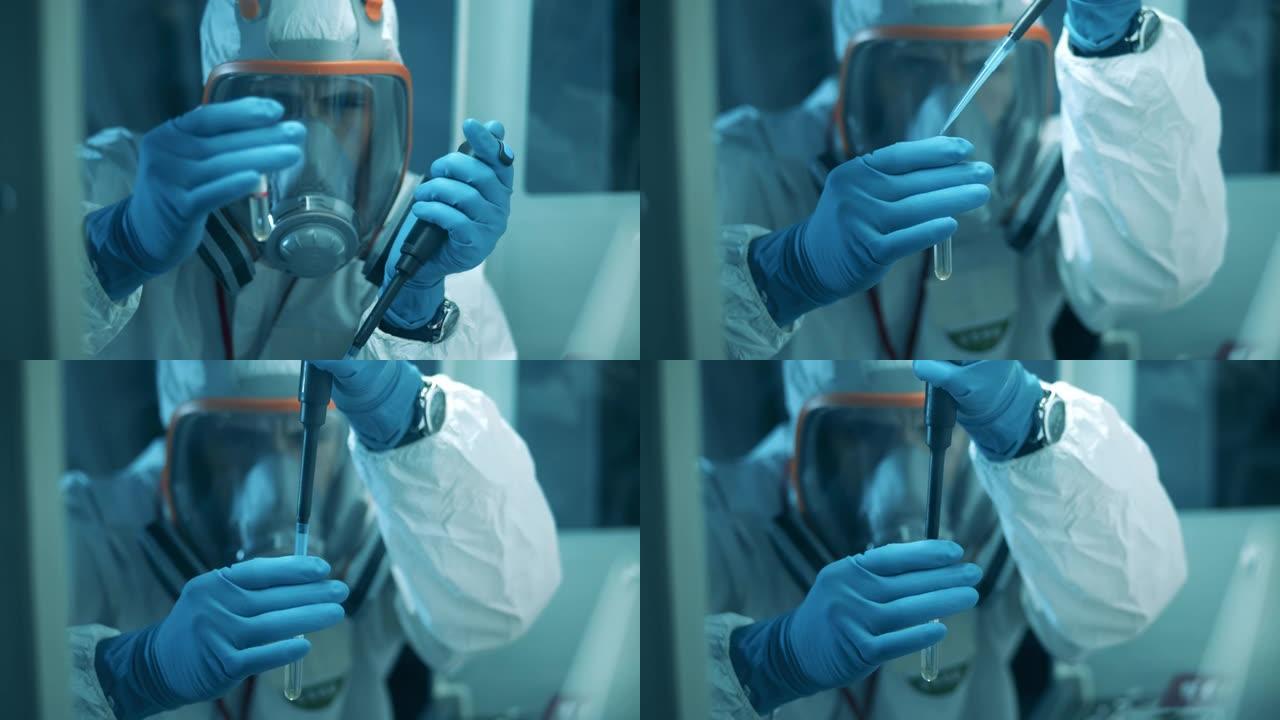 危险品中的一名男子在实验室工作时使用移液管和管子。Covid19，冠状病毒概念。