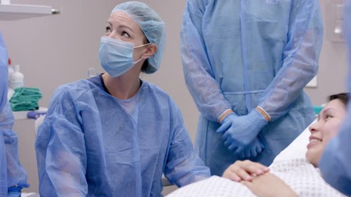 高加索医生与她的外科团队一起对孕妇进行手术