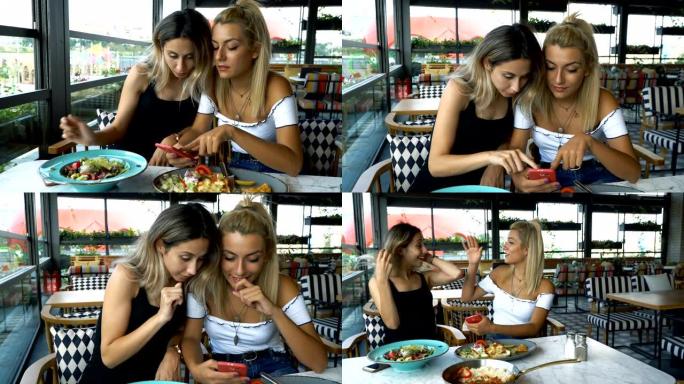 4k两个年轻女人在咖啡馆或餐馆里交谈。