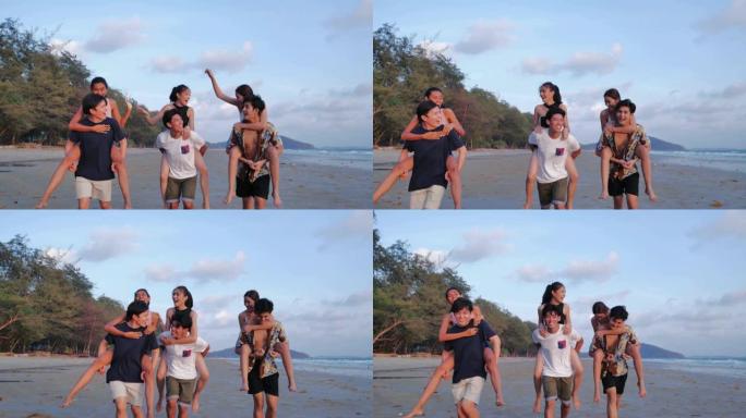 暑假期间，快乐的男朋友在热带海滩上piggy带他们的女朋友，一起欢笑。假期-iStock