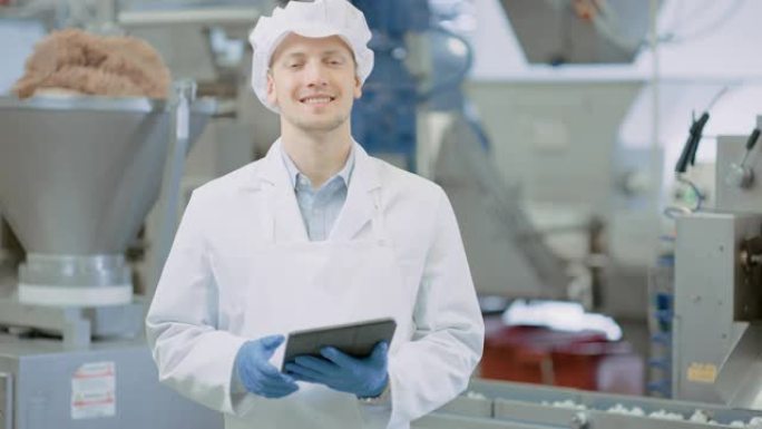 技术员正在饺子食品工厂检查自动化生产