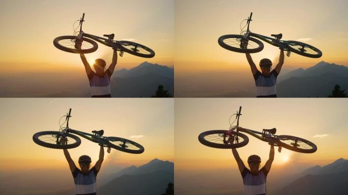 镜头耀斑早晨的阳光照耀着激动的人，将自行车举过头顶