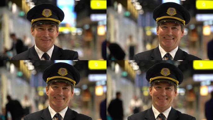 英俊的高加索飞机飞行员在机场面对镜头微笑