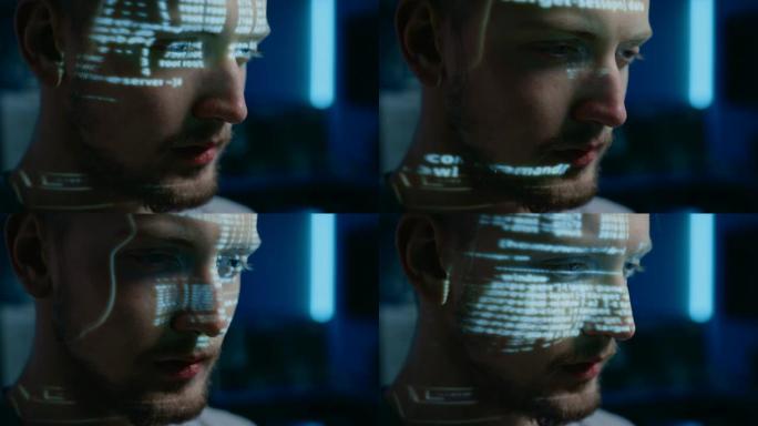 在数字身份网络安全数据中心的计算机上工作的英俊软件开发人员的肖像，投影的程序编码语言反映在他的脸上。