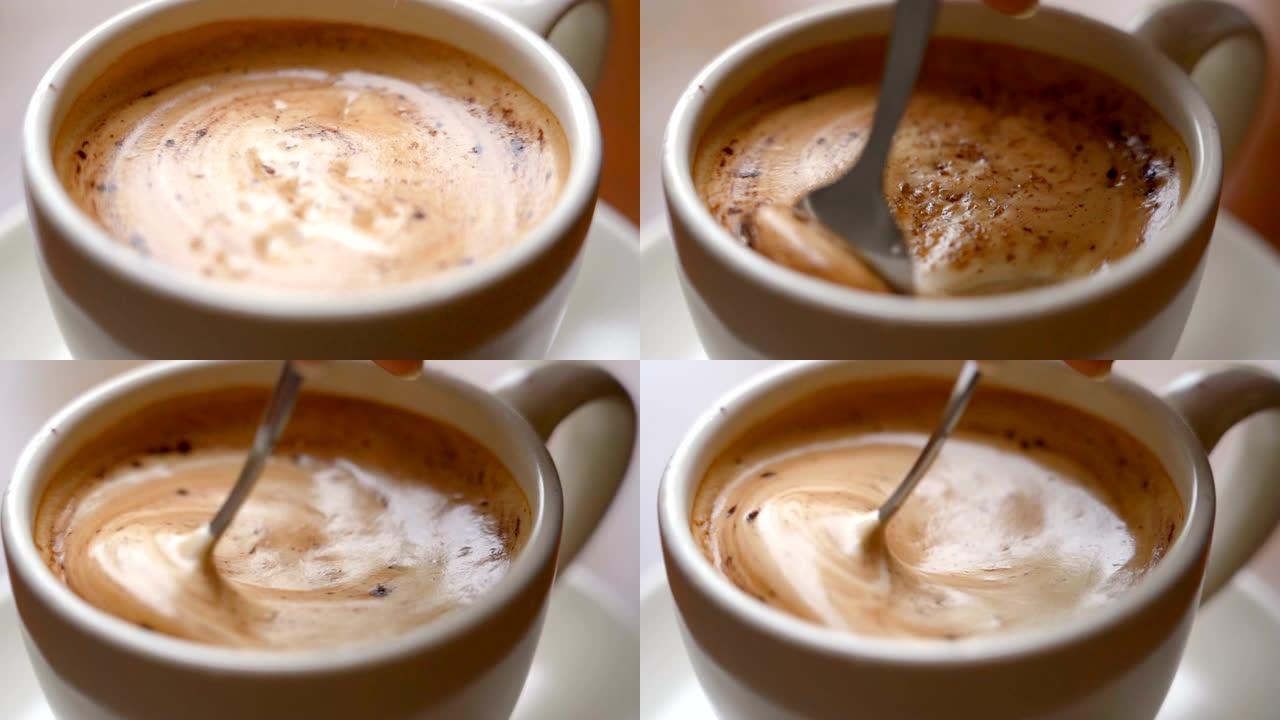 特写镜头倒糖和混合咖啡。