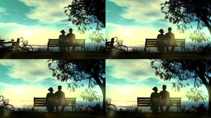 情侣坐在长凳上看着海洋