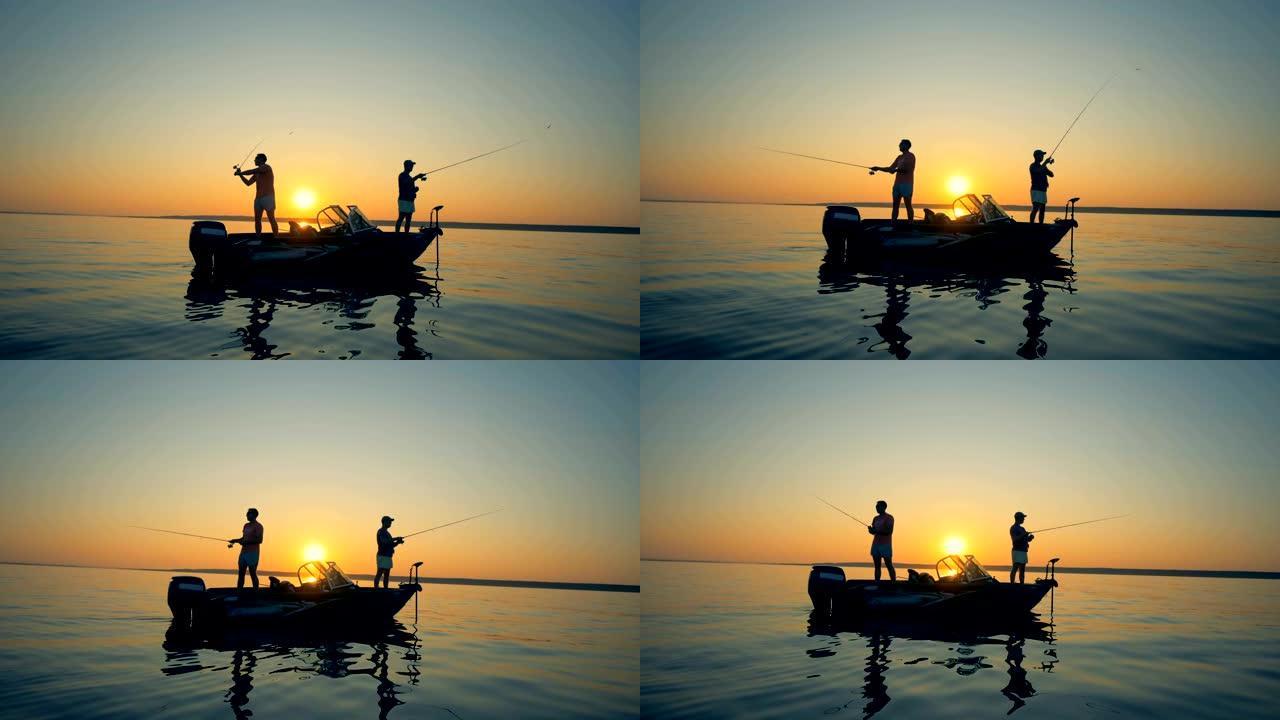 日落背景上的渔民，侧视图。