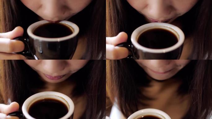 女人的特写脸在咖啡馆喝咖啡