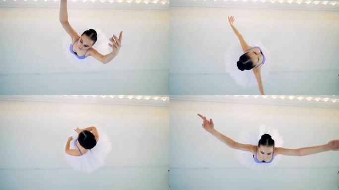 优美的芭蕾舞女演员旋转的俯视图