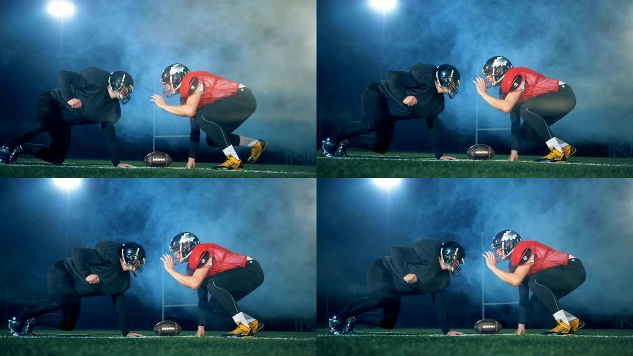 美式足球运动员站在一个靠近球的姿势，侧视图。