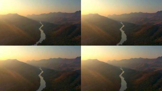 日出时国家公园热带雨林大坝风景的鸟瞰图