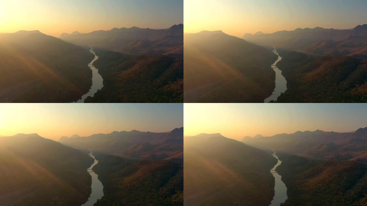 日出时国家公园热带雨林大坝风景的鸟瞰图