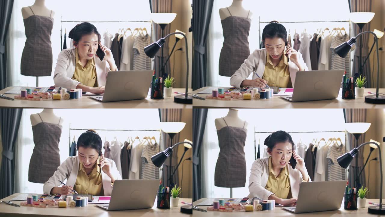 亚洲时装设计师与她的客户电话设计师解决方案