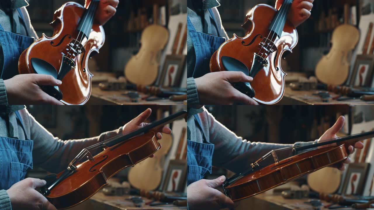 工匠制琴师在车间控制手工小提琴质量的慢动作特写
