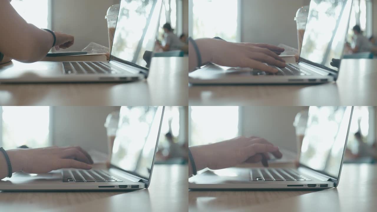 年轻女性在启动办公室使用智能手机和笔记本电脑，慢动作