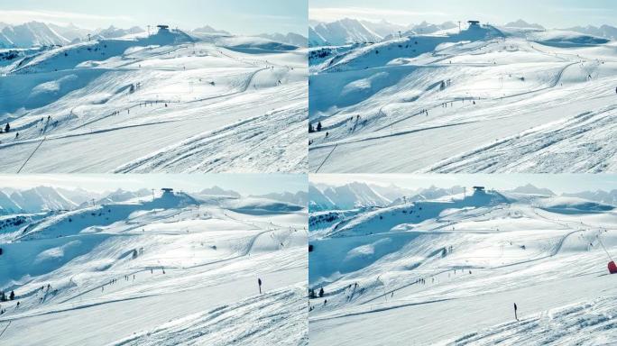 在阳光明媚的日子里滑雪。手持可穿戴相机