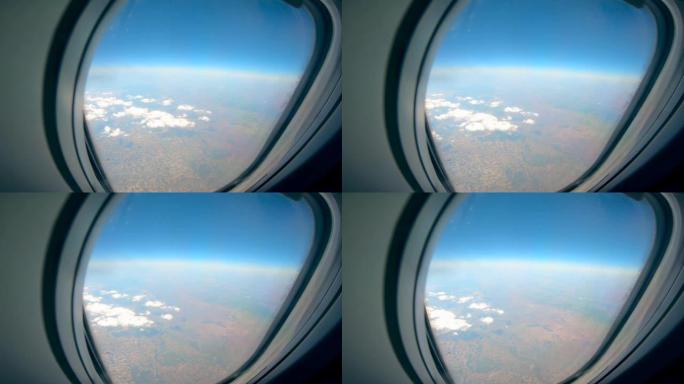 从飞机上显示云和陆地