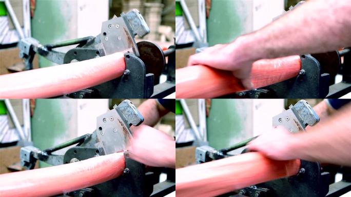 工人用切割机切割红色猪鬃。