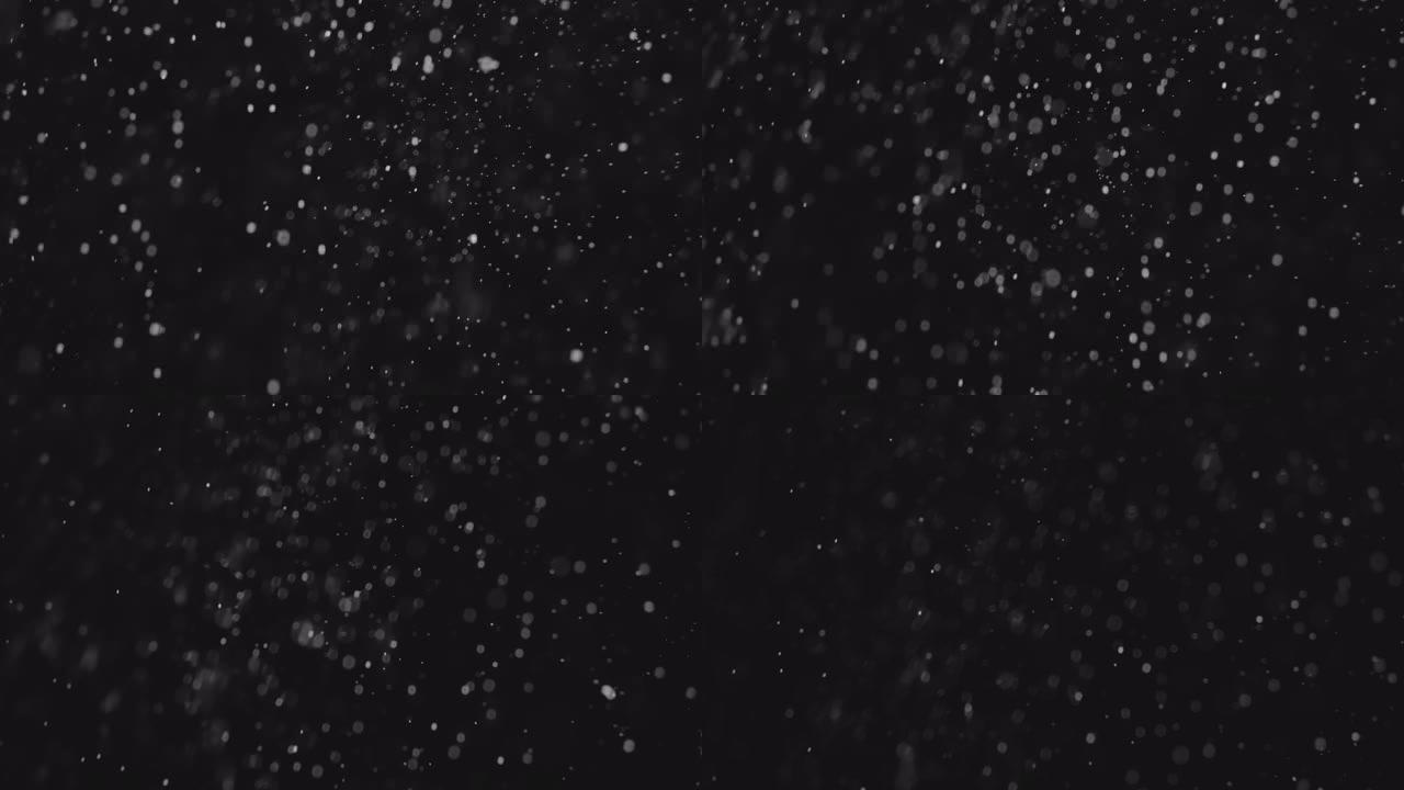 黑色背景上的降雪纹理背景