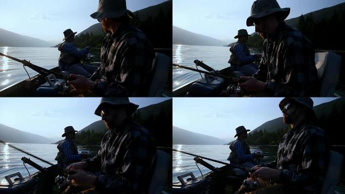 两名渔民在4k河中捕鱼