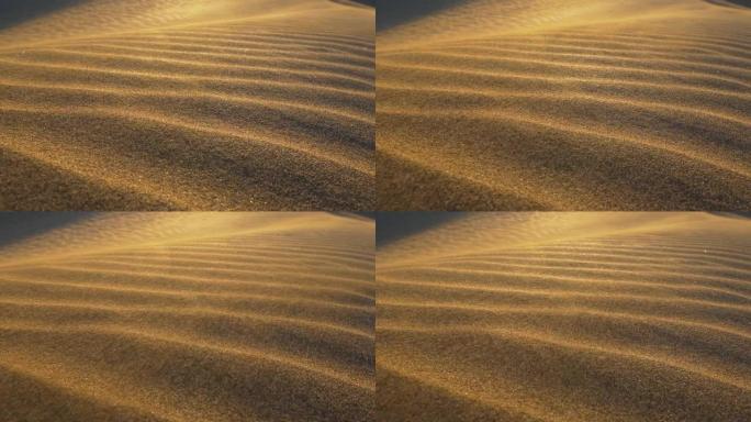 沙漠中的沙尘暴。风中吹过沙丘的沙子