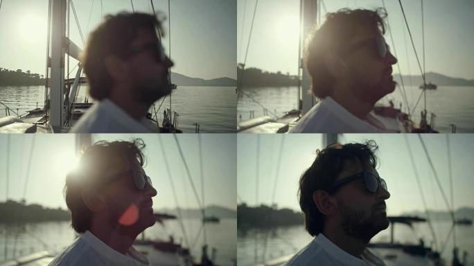 男子在游艇上冥想实拍视频素材