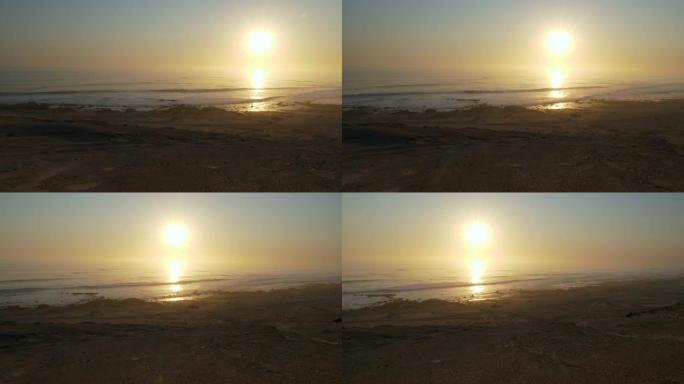 纳米比亚骨架海岸公园，海洋上美丽日落的4k平移视图