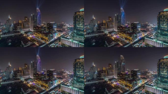 曼谷城市景观的4k时间流逝，在曼谷夜间高峰时间在现代建筑和交通路口进行惊人的灯光表演，具有城市景观概