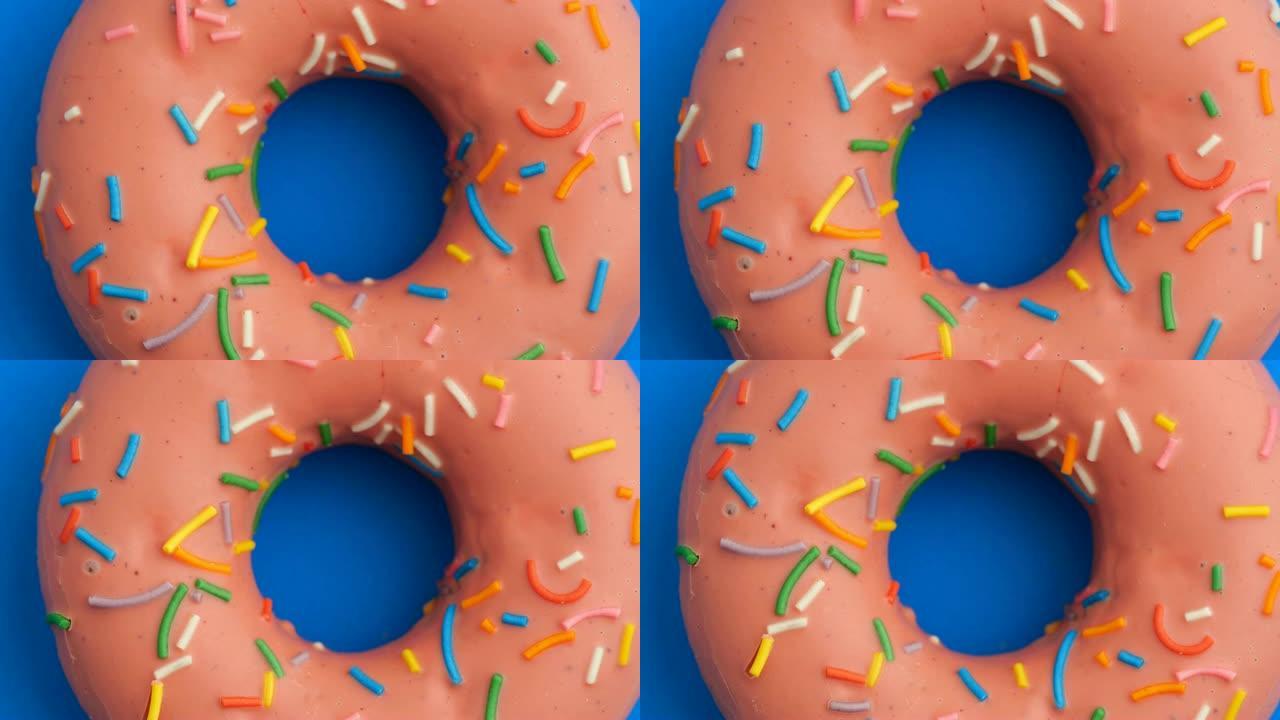 甜甜圈釉面特写。甜甜圈视频素材彩色甜甜圈