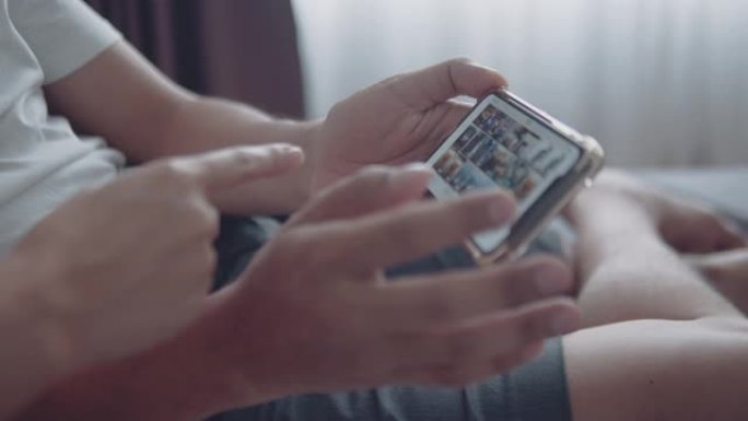 幸福的夫妻在平板电脑上观看超声波检查视频