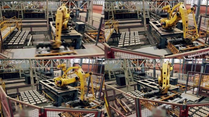 工厂车间的机械臂在传送带上分类砖块。