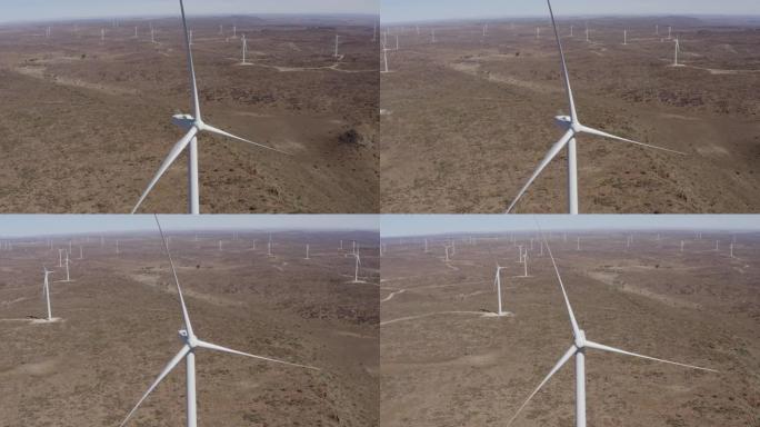 风力涡轮机未转动的4k空中特写视图，这导致产生能量的主要问题