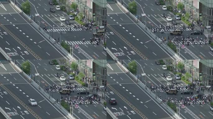 在日本东京的银座十字路口行走的慢动作行人