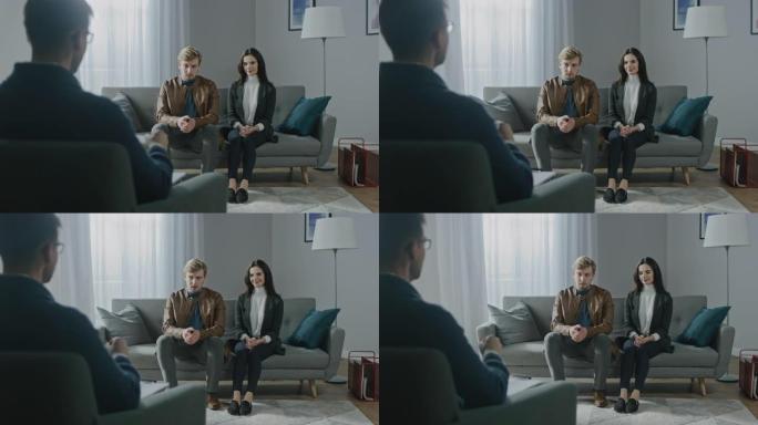 年轻夫妇与心理治疗师咨询。治疗师的后视图: 年轻人坐在分析师沙发上，讨论心理创伤，人际关系问题和痛苦