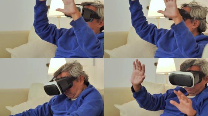 高级男子在VR体验期间触摸空气。高级技术，生活方式，愿景，创新，科学，教育，退休理念。