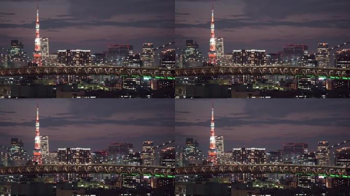 日本东京彩虹桥与东京铁塔在日落