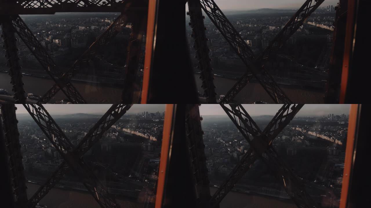 电影背景拍摄，相机在玻璃电梯内，在巴黎埃菲尔铁塔钢结构钢筋内向上移动。