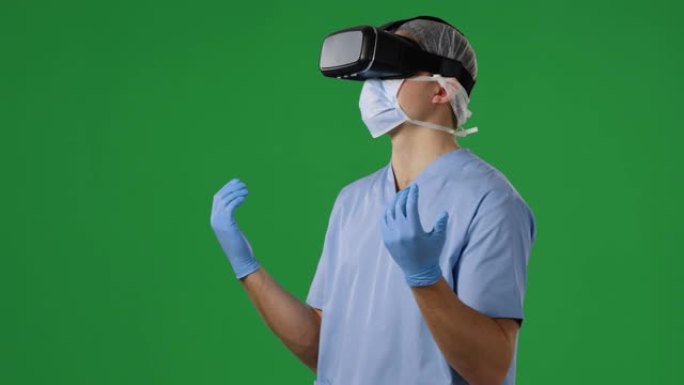 穿着磨砂膏和VR耳机的年轻外科医生