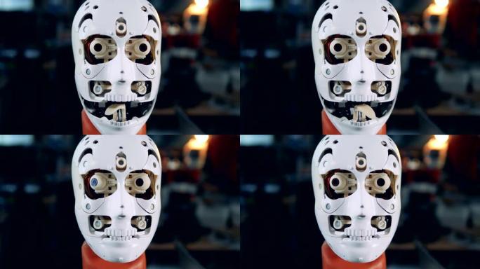 现代机器人移动的眼睛和舌头，特写。
