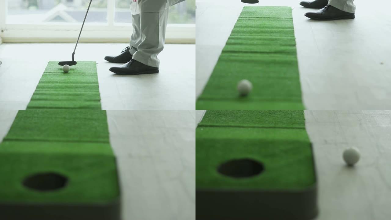 高尔夫球滚入洞中的慢动作