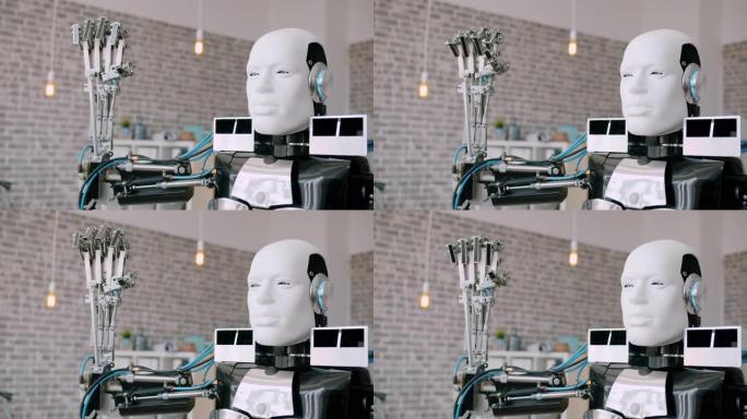 开发人员测试期间，智能自动化机器人在办公室动手做拳头