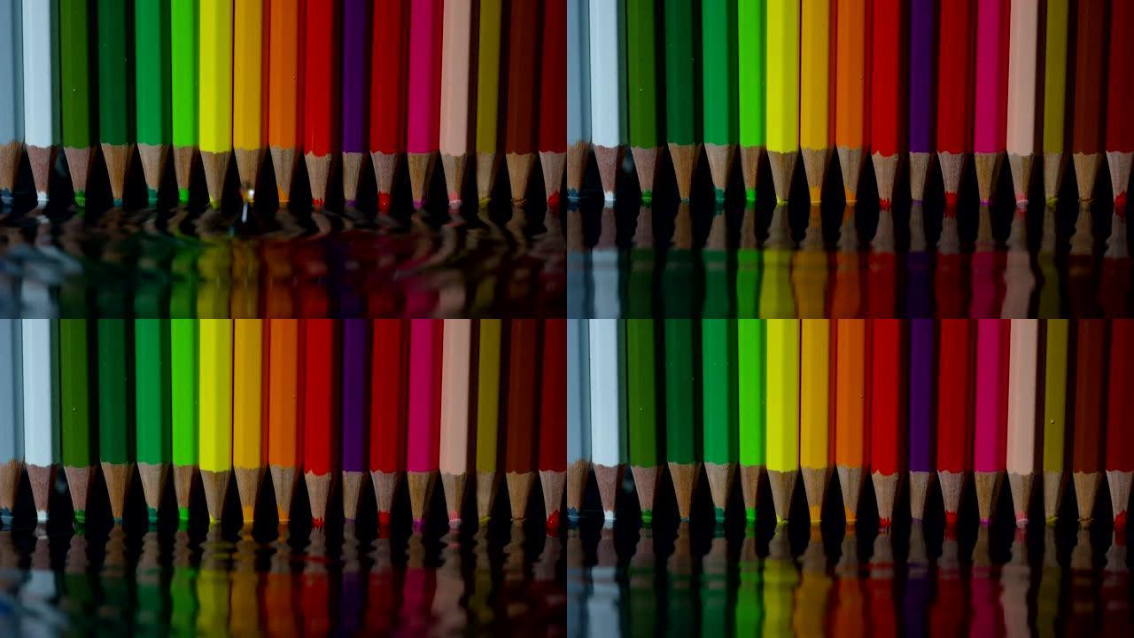 彩色铅笔在各种彩色水面上水彩。