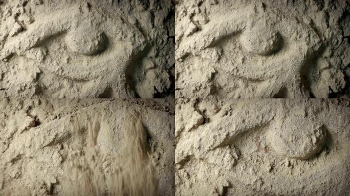 沙子从埃及的石头上掉下来-考古学概念