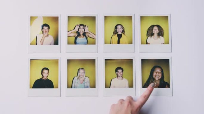 年轻男女的即时电影照片，用于用女性手指制作选择造型