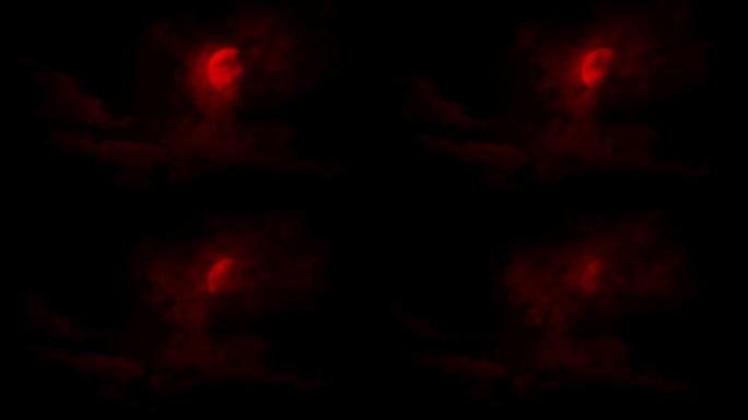云朵在可怕的红色月亮上移动