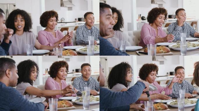 一个黑人家庭坐在餐桌旁，说格蕾丝然后提供食物