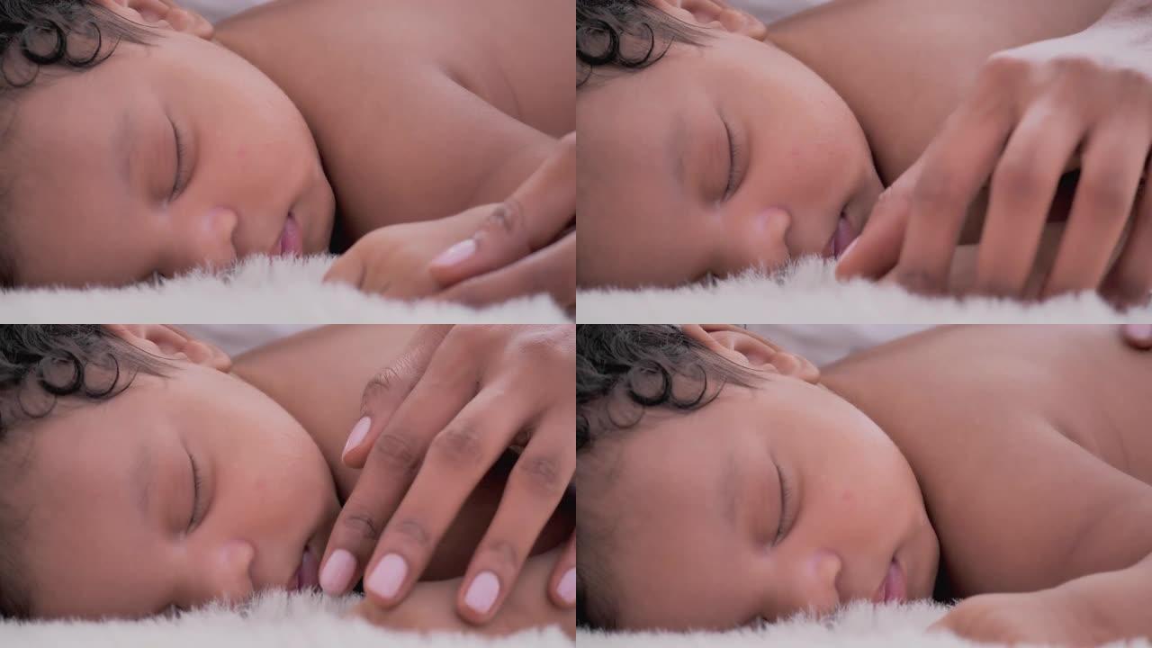 特写镜头，非洲母亲在卧室里睡觉时认识1个月的新生婴儿。幸福的爱的家庭。家庭关系。家庭时刻概念。