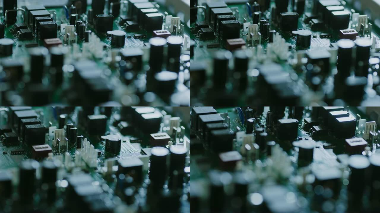 主板上有微芯片、晶体管、半导体、电容器的电子印刷电路板的特写微距拍摄。